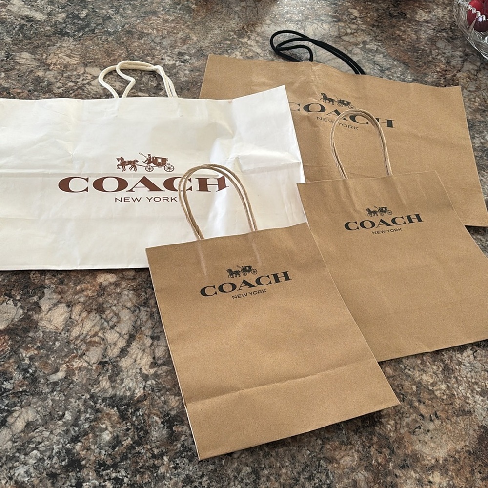Coach set of 4 paper shopping bags use as gift bags for your coach items